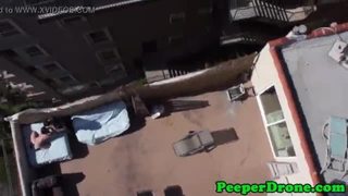 Drone films rooftop sex